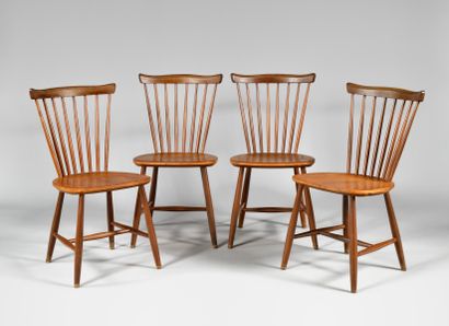 WORK OF THE 1960S Suite of four chairs, curved...