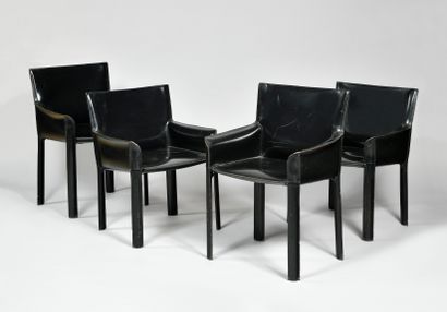 null DE COURO OF BRAZIL Suite of eight metal and plywood armchairs entirely upholstered...