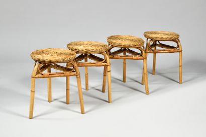 null WORK OF THE 1960S Suite of four tripod stools in rattan, woven seats Wear and...