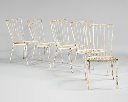 WORK OF THE 1950's Suite of ten chairs and...