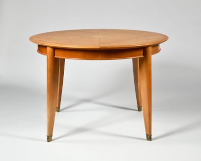 WORK OF THE 1950S Sycamore veneer table with...