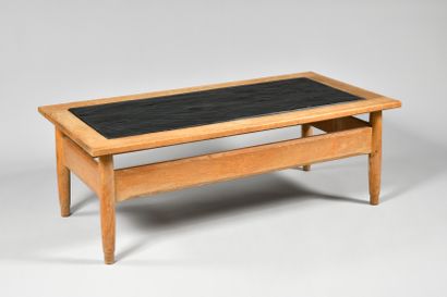 null WORK OF THE 1960's Rectangular oak coffee table with a slate top, four spindle...