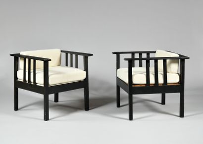  WORK OF THE 1920S Pair of cubic armchairs in black lacquered wood with three lateral...