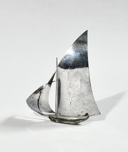 null CARL HAGENAUER (1871-1928), ATTRIBUTED TO A Sailboat on waves in chromed metal...