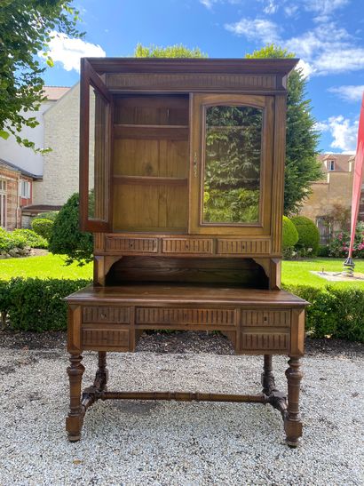 null BUREAU-BLIOTHEQUE in walnut opening with five drawers in the waist carved decoration...