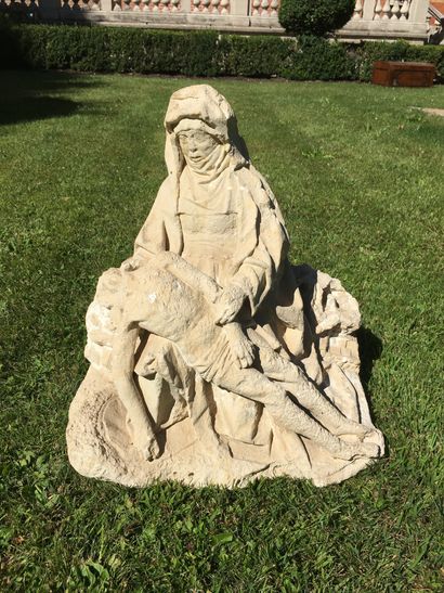 null VIRGIN OF MERCY IN SCULPTED LIMESTONE. The Virgin carries on her knees the body...