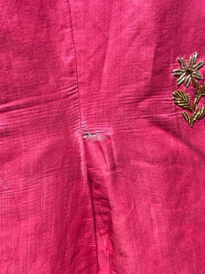 null TURKEY Kaftan, circa 1900, fuchsia satin embroidered with gold frieze of flowers...