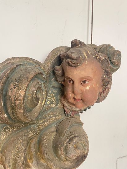 null Important polychromed SCULPT WOOD representing cherubs' heads in clouds. Northern...