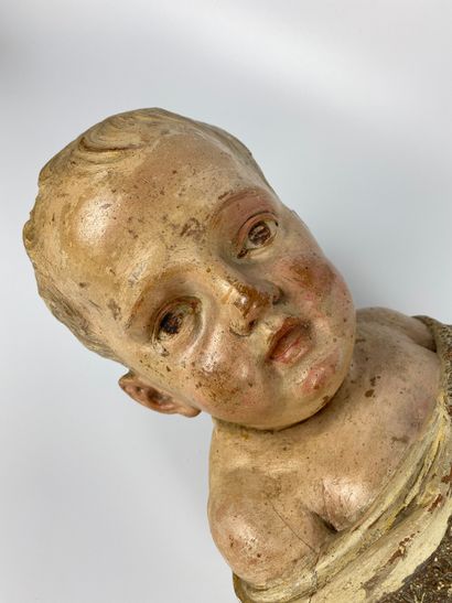 null Important SANTON in polychrome terra cotta decorated with a swaddled child....