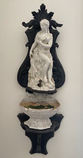 null WALL FOUNTAIN in white enamelled earthenware decorated with a stylized Venus...
