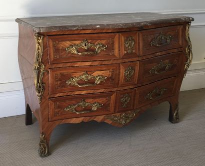 null WOODEN COMMODE in veneer and marquetry opening with four drawers on three rows...