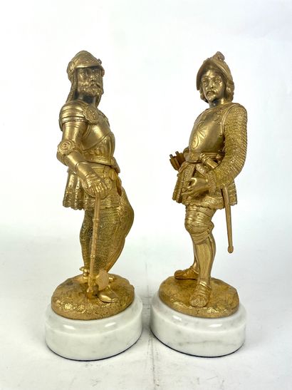 null FRENCH SCHOOL of the XIXth century Men in armor Pair of gilded bronzes on white...