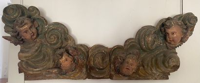 null Important polychromed SCULPT WOOD representing cherubs' heads in clouds. Northern...