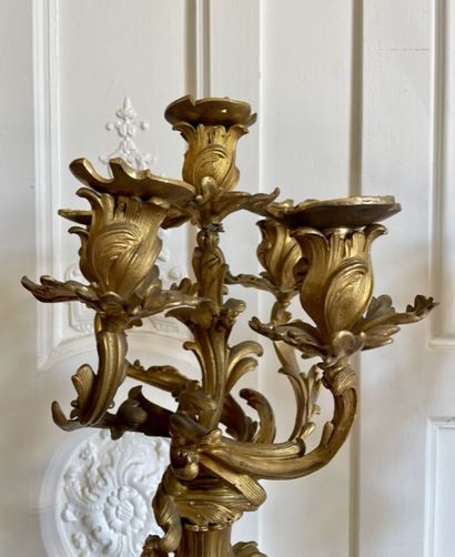 null PAIR OF CANDELABRES in gilded and chased bronze with five moving arms of lights,...