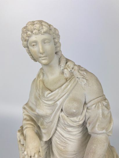 null Bisque STATUTE representing a vestal woman leaning on a column. Louis XVI period...