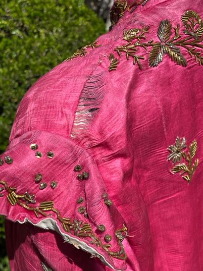 null TURKEY Kaftan, circa 1900, fuchsia satin embroidered with gold frieze of flowers...