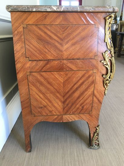 null WOODEN COMMODE in veneer and marquetry opening with four drawers on three rows...