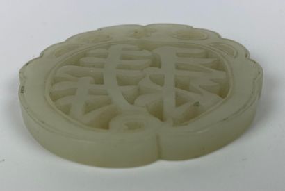 null CHINA Light grey jade plate carved and openworked with a sinogram. Diameter...