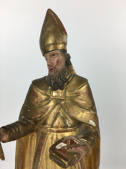null PIQUE-CIERGE en bois doré et laqué représentant Saint Nicolas. XIXe siècle H:...
