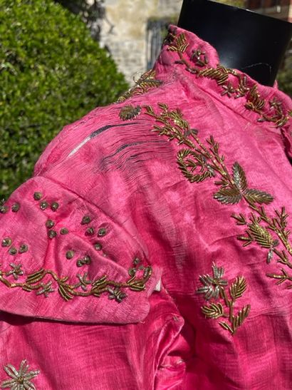 null TURKEY Kaftan, circa 1900, fuchsia satin embroidered with gold frieze of flowers...