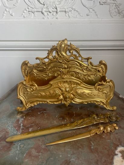 null Gilt bronze and chased letter-holder with rocaille decoration. Two gilt bronze...