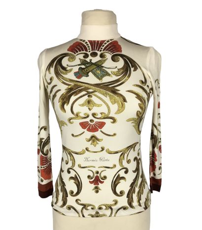 null HERMES PARIS Two light sweaters with high collars, one beige with golden plant...