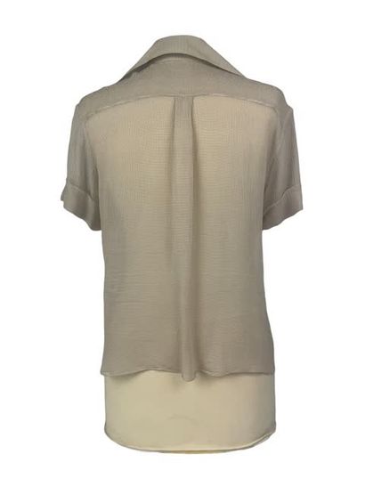 null HERMES PARIS Light beige silk crepe blouse, short sleeves, notched collar, pointed...