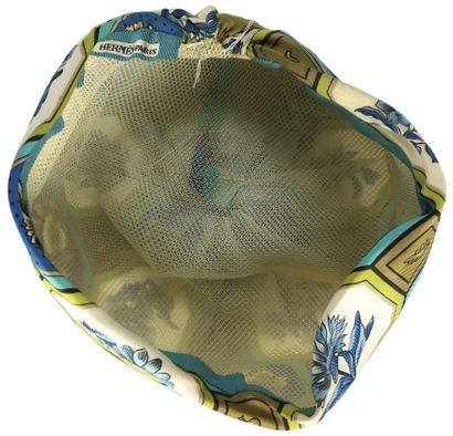 null HERMES PARIS Turban tied on top in blue, beige, yellow and khaki silk with plant...