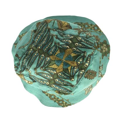 null HERMES PARIS Silk bob with gold thread and pearl motif on a turquoise blue background....
