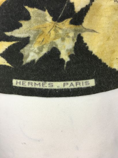 null HERMES PARIS Two light cashmere sweaters, one with a round neck with long sleeves...
