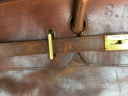 null HERMES PARIS Circa 1970 50 cm high travel bag with strap in natural cowhide,...