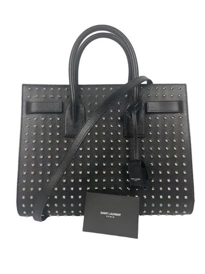 null YVES SAINT LAURENT Handbag "day bag" in black grained leather, decorated with...