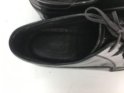 null TOD'S Pair of lace-up shoes in black patent. Rubber sole with studs. Box. T...