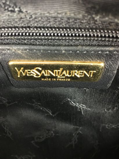 null YVES SAINT LAURENT Black leather handbag decorated with two stylized hearts....