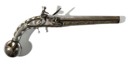 null NORTH AFRICAN FLINTLOCK PISTOL. Round barrel. Chased lock and hammer with flat...