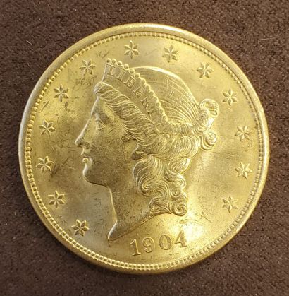 null Coin "Liberty" of 20 american dollars gold of the year 1904. Weight : 33, 46...