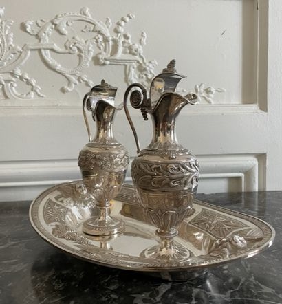 null PAIR OF BURETTES resting on a silver plate decorated with Love, bunches of grapes,...