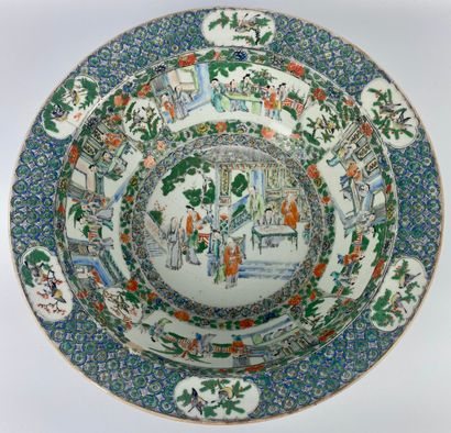null CHINA 

Polychrome porcelain basin with green family enamel decoration of characters...