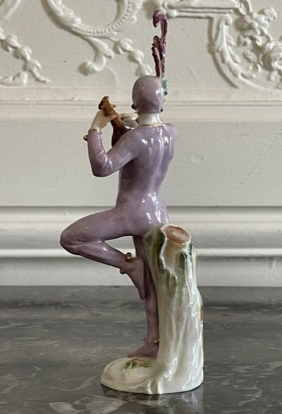null GERMANY 

Four groups in polychrome porcelain including : 

- a Pierrot playing...