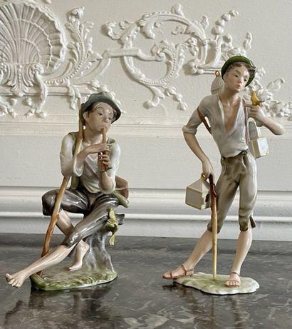 null GERMANY 

Four groups in polychrome porcelain including : 

- a Pierrot playing...
