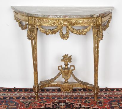 null HALF-LUNE CONSOLE, LOUIS XVI, in wood, gilded, molded, carved and openwork decorated...