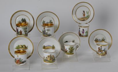 null PORCELAINE DE PARIS :

Lot de sept tasses et leur sous tasses, à décor polychrome...