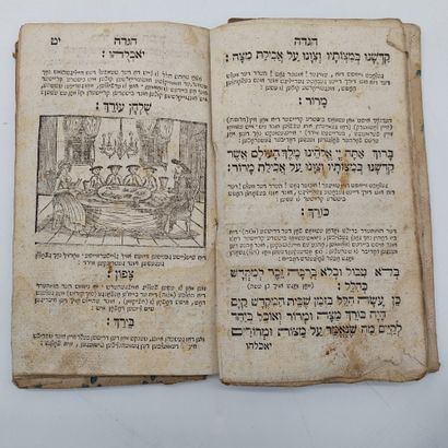 null EASTER HAGGADAH from the 18th century 



A modern Passover Haggadah and a Hebrew...