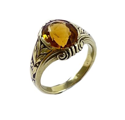 null BAGUE

retenant un béryl ovale dans un décor végétal. Monture en or jaune 14K....