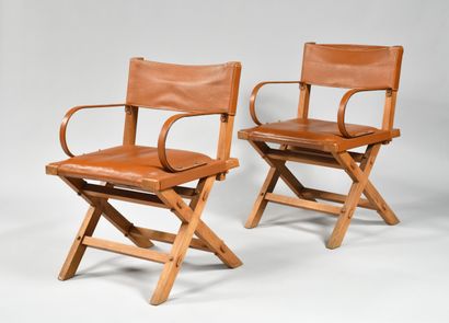 null JACQUES ADNET (1900-1984)

Suite de quatre fauteuils en frêne à piètement en...