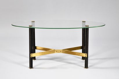 null MATHIEU MATÉGOT (1910-2001)

Modèle «Canasta»

Table basse à plateau ovale en...
