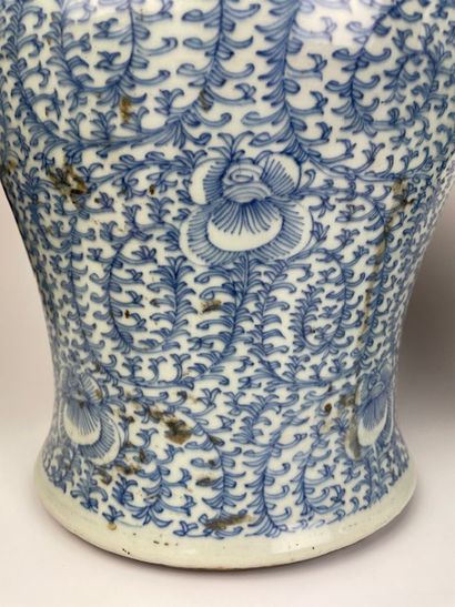 null CHINA 

Pair of blue and white porcelain covered potiches decorated with floral...
