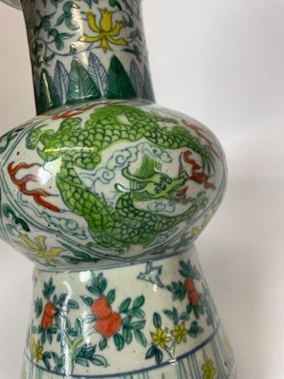 null CHINA

Gu vase in doucai porcelain, with enamelled decoration of dragons and...