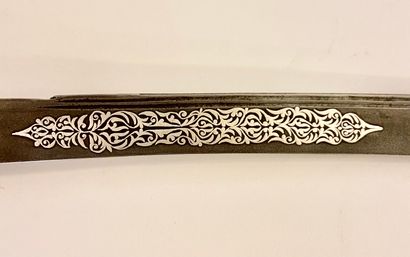 null CAUCASIAN YATAGAN

Blade decorated with a silver plate

Steel, wood, silver

71...