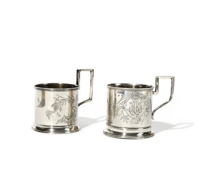 TWO GLASS HOLDERS for tea

Engraved silver

Hallmarks:...